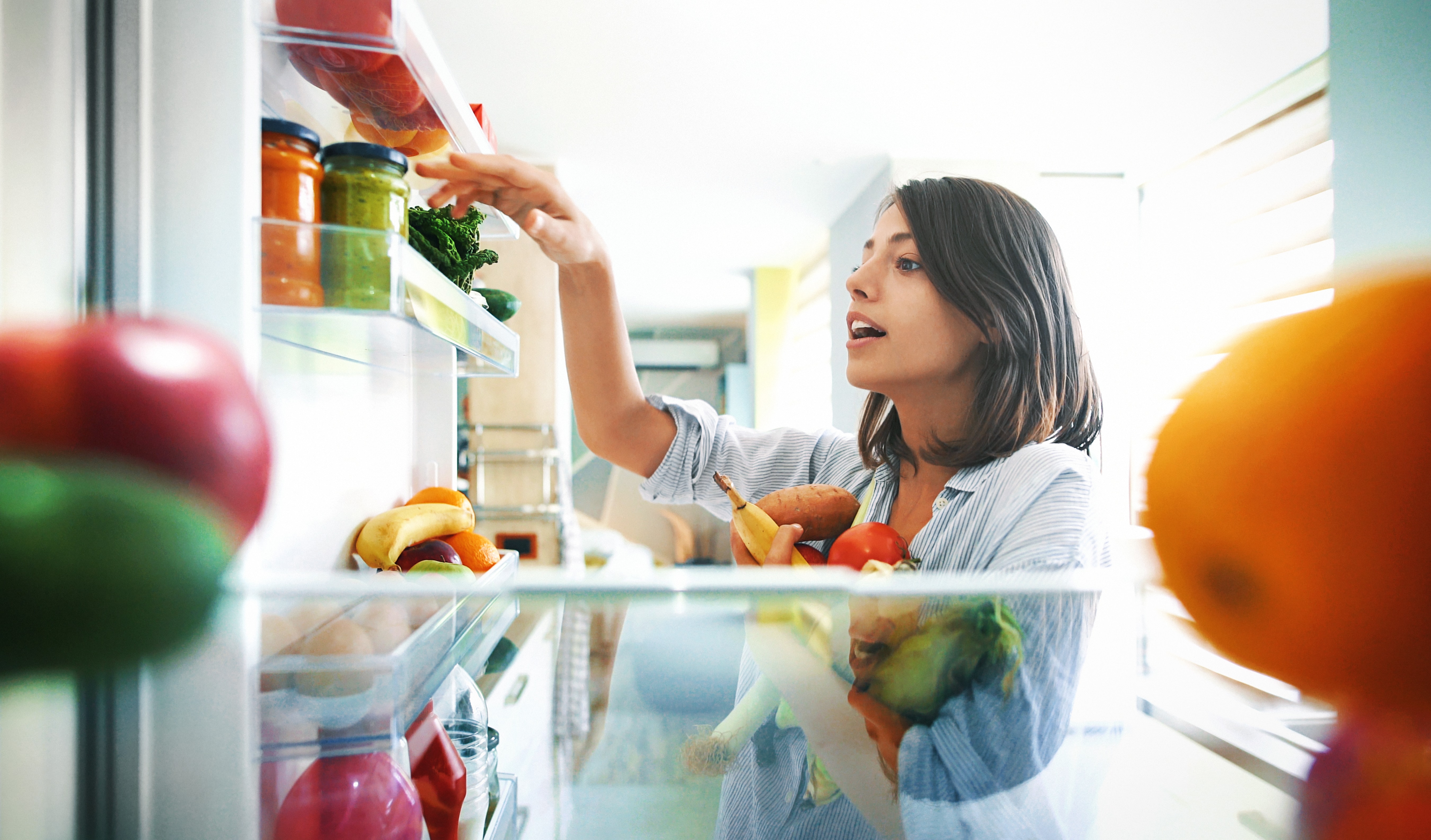 woman eating healthy food to relieve her PMS symptoms