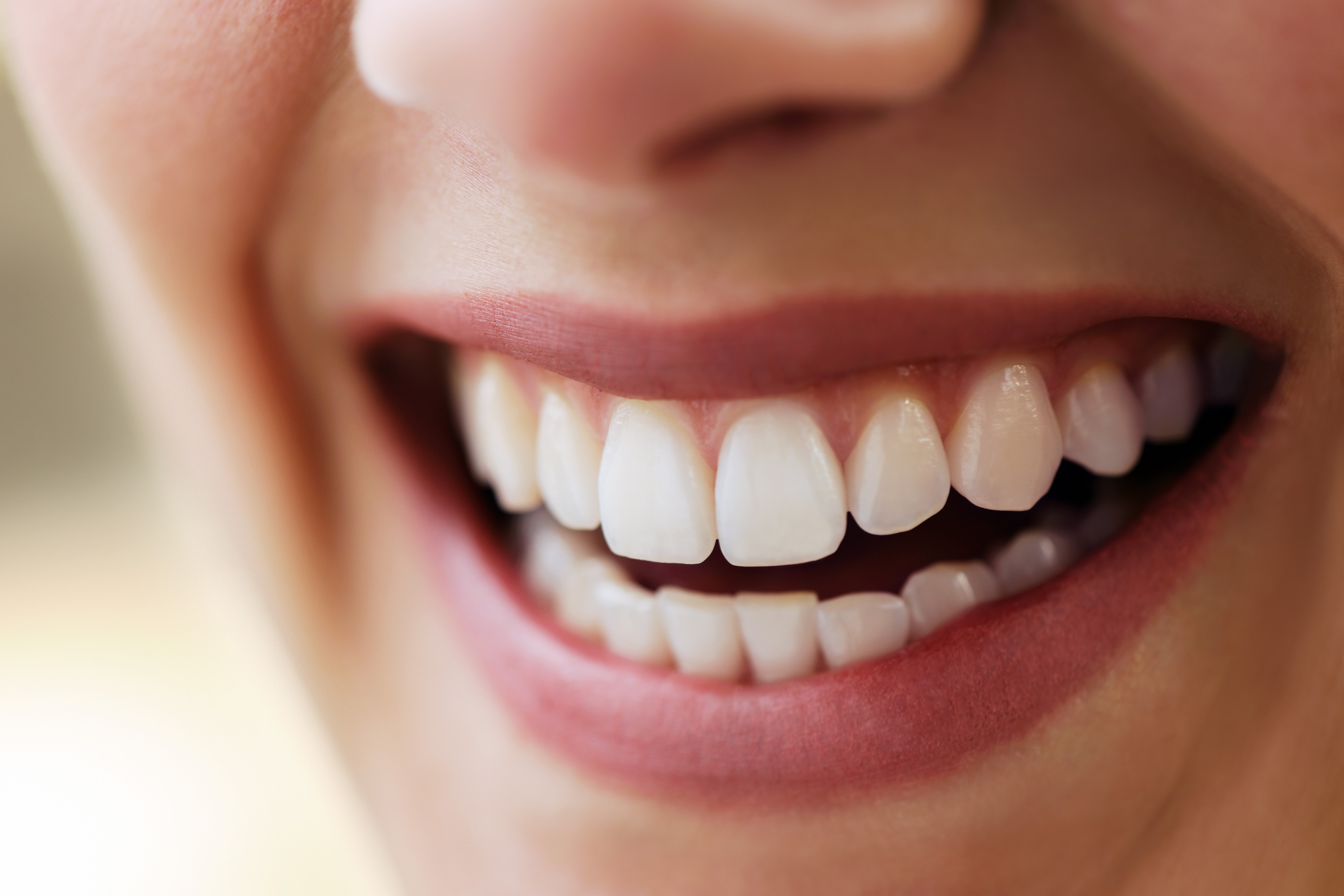 woman smiling showing teeth