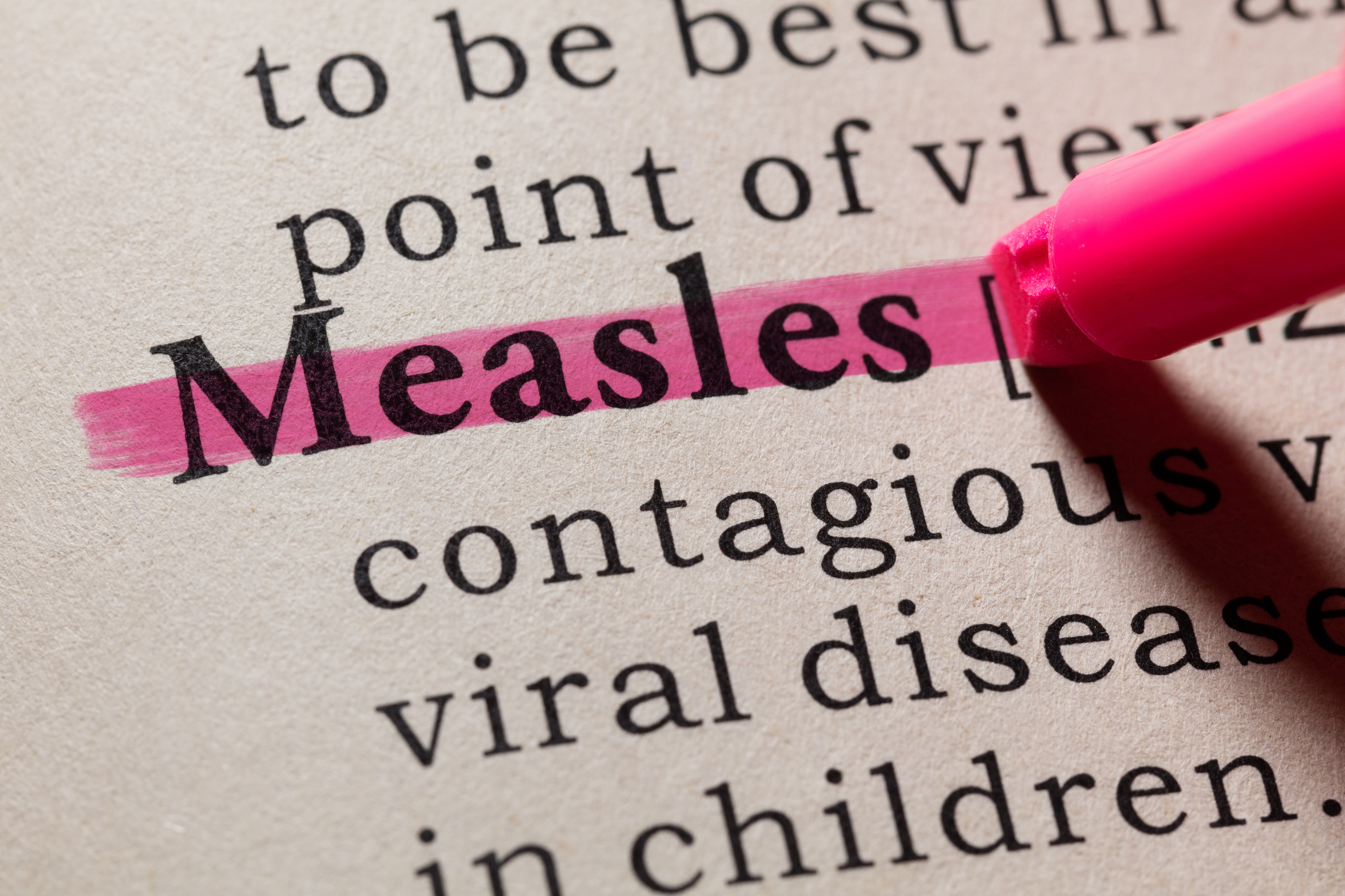 medical definition of measles highlighted with pink